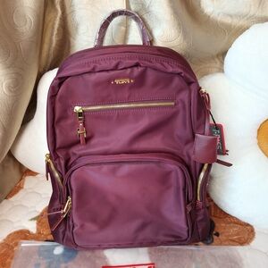 Tumi Maroon Backpack with Gold Details